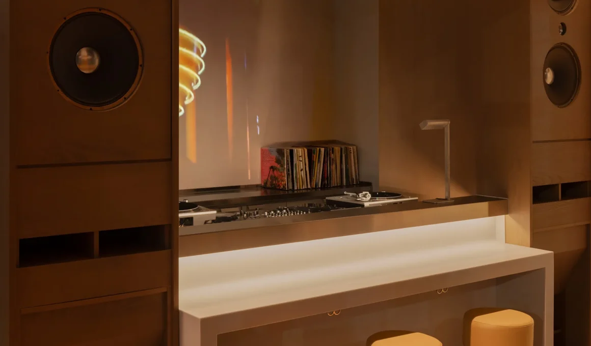 Bespoke DJ booth with Technics turntables and vintage JBL speakers at Postcard Chicago.