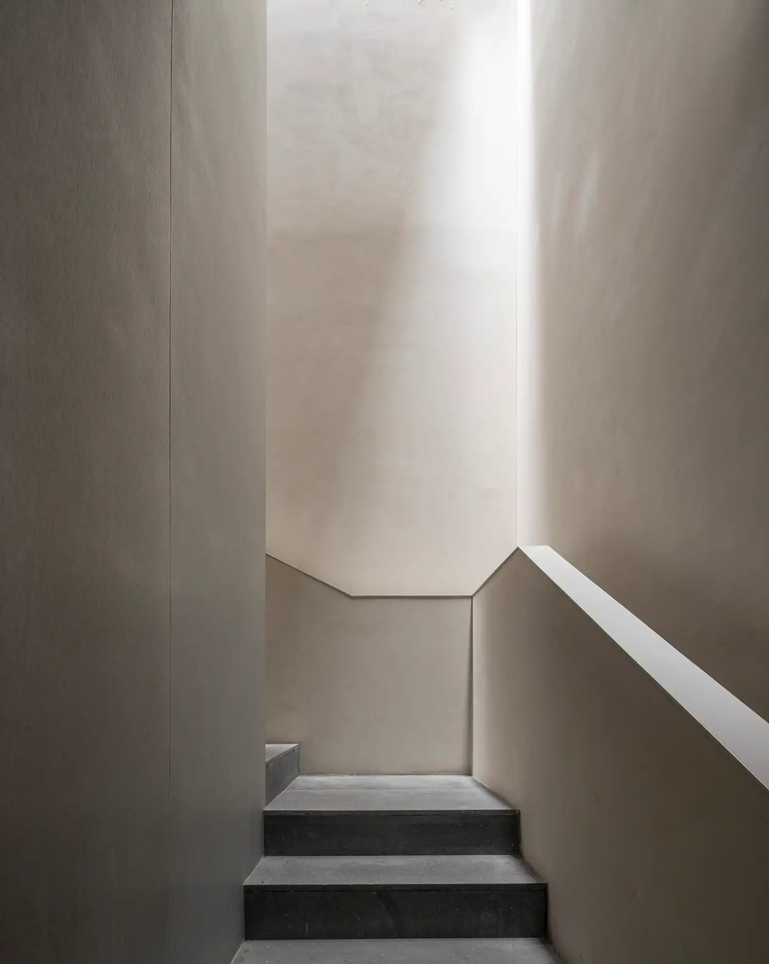 PPAA LAMARTINE vertical light shaft and stone staircase