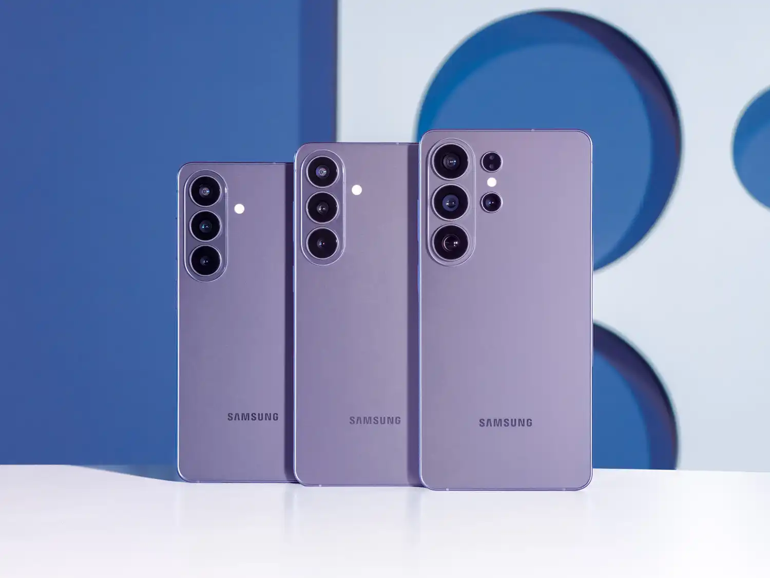Rear view of the Galaxy S26, S26+, and S26 Ultra in Cobalt Violet arranged by size.