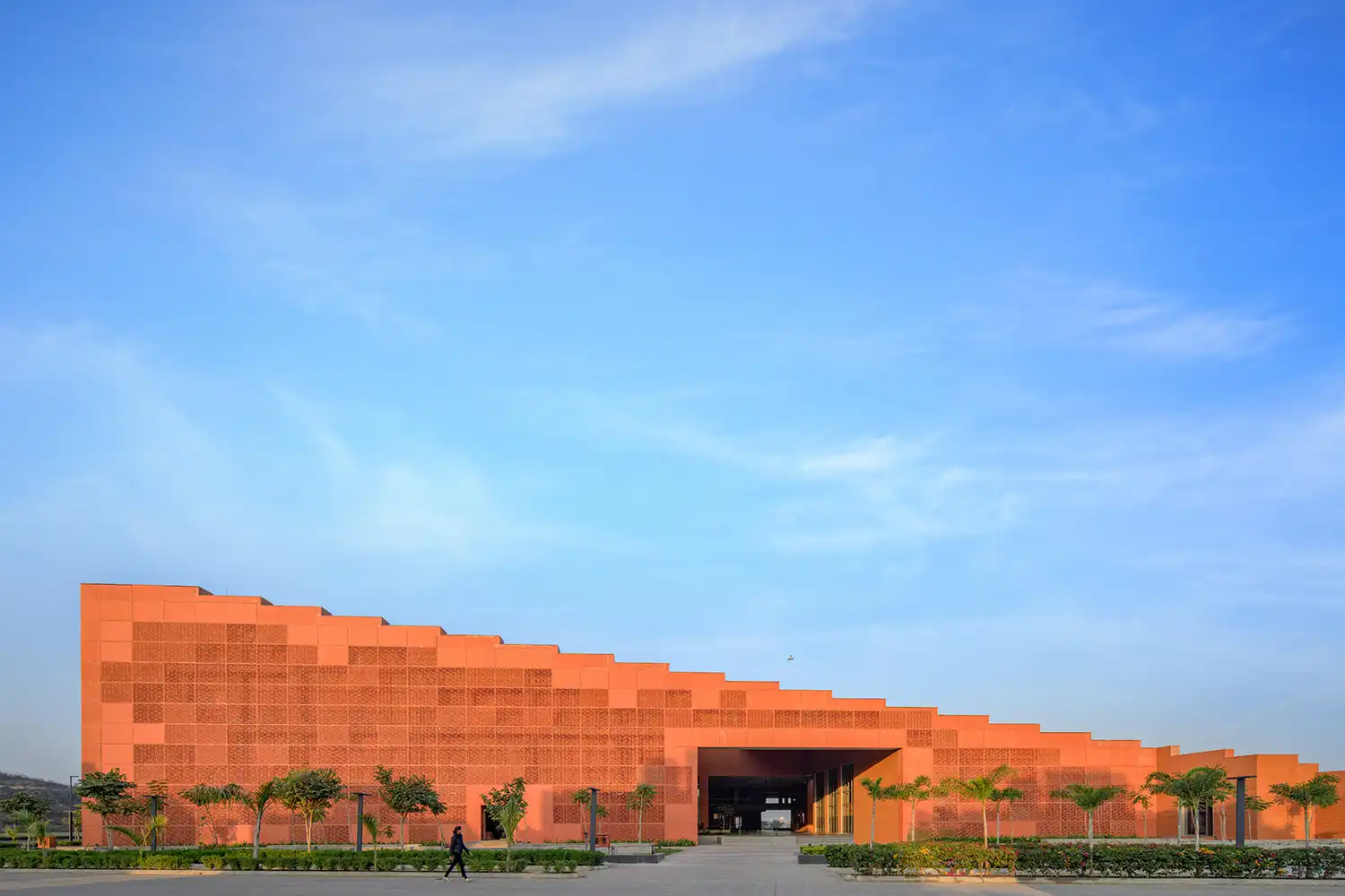 Side elevation of the building showing GFRC screens and the stepped profile.