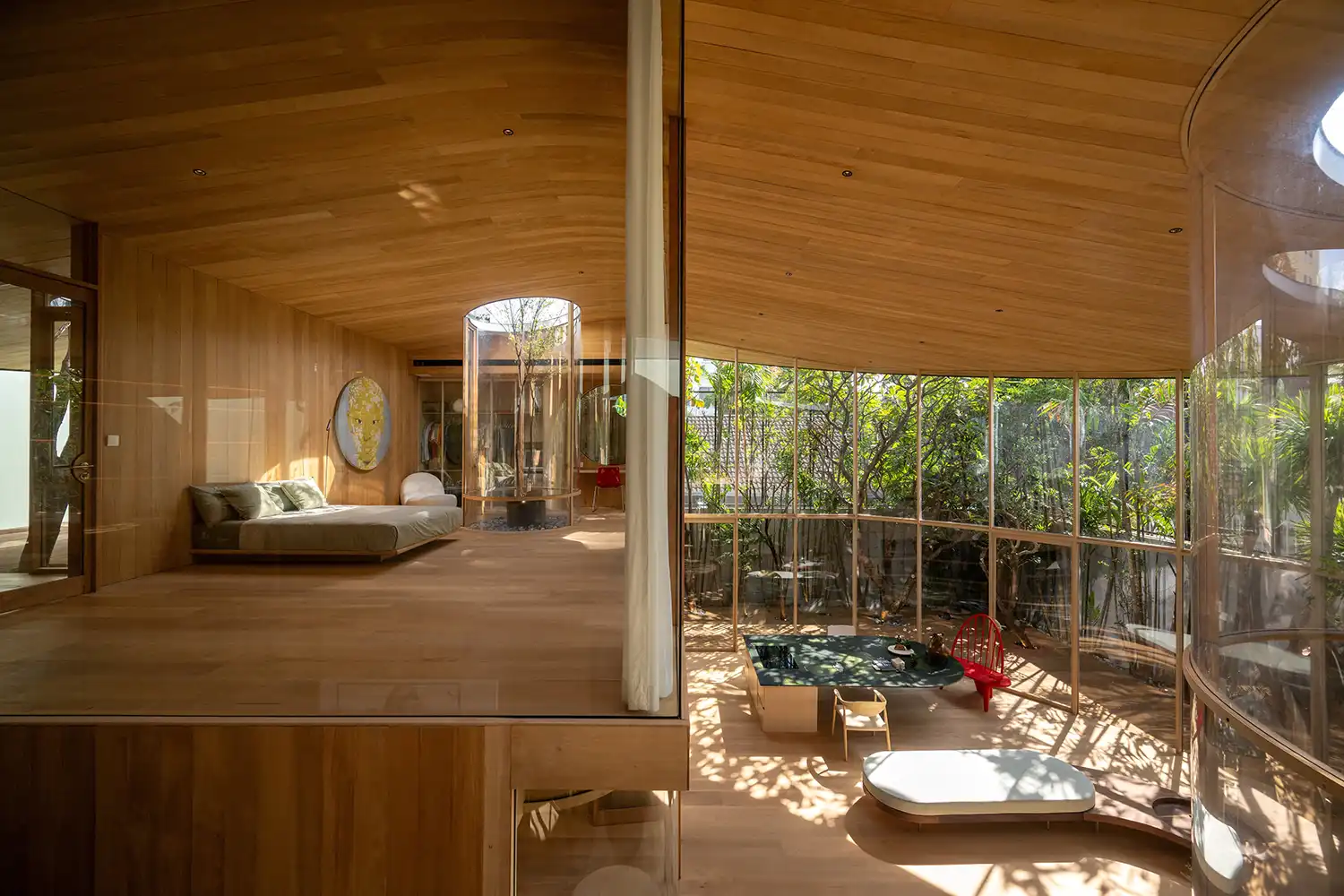 View from an upper-level bedroom overlooking the double-height living space.