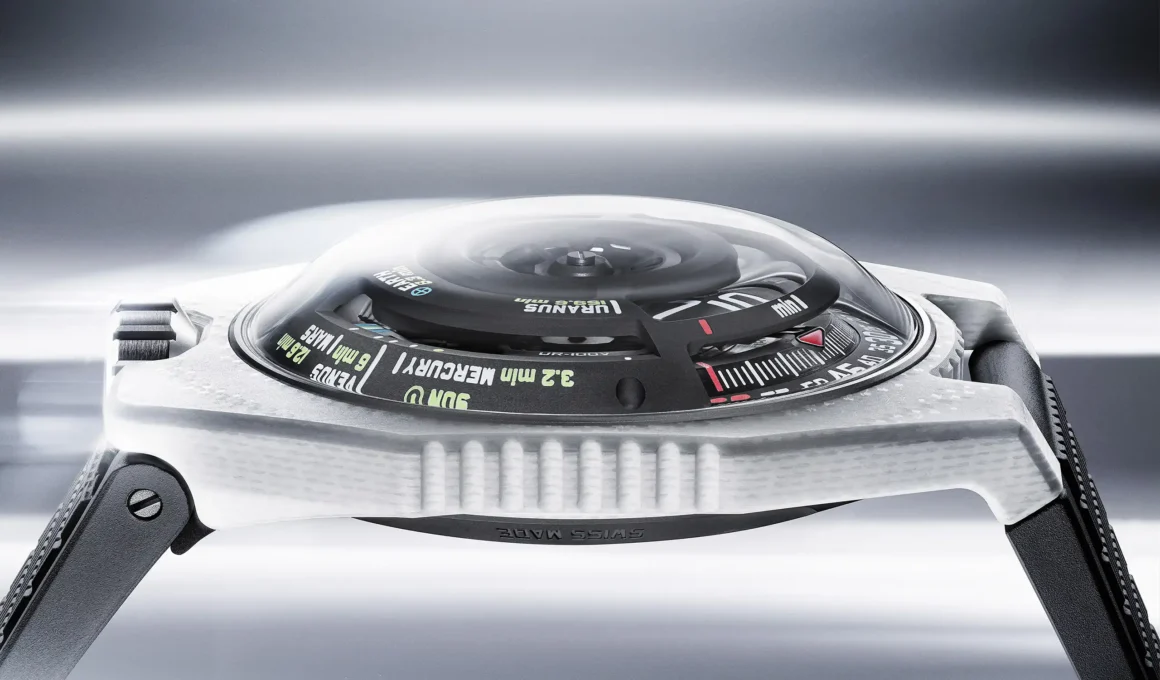 Side profile of the URWERK UR-100V LS Ceramic showing the domed sapphire crystal and stratified white case.