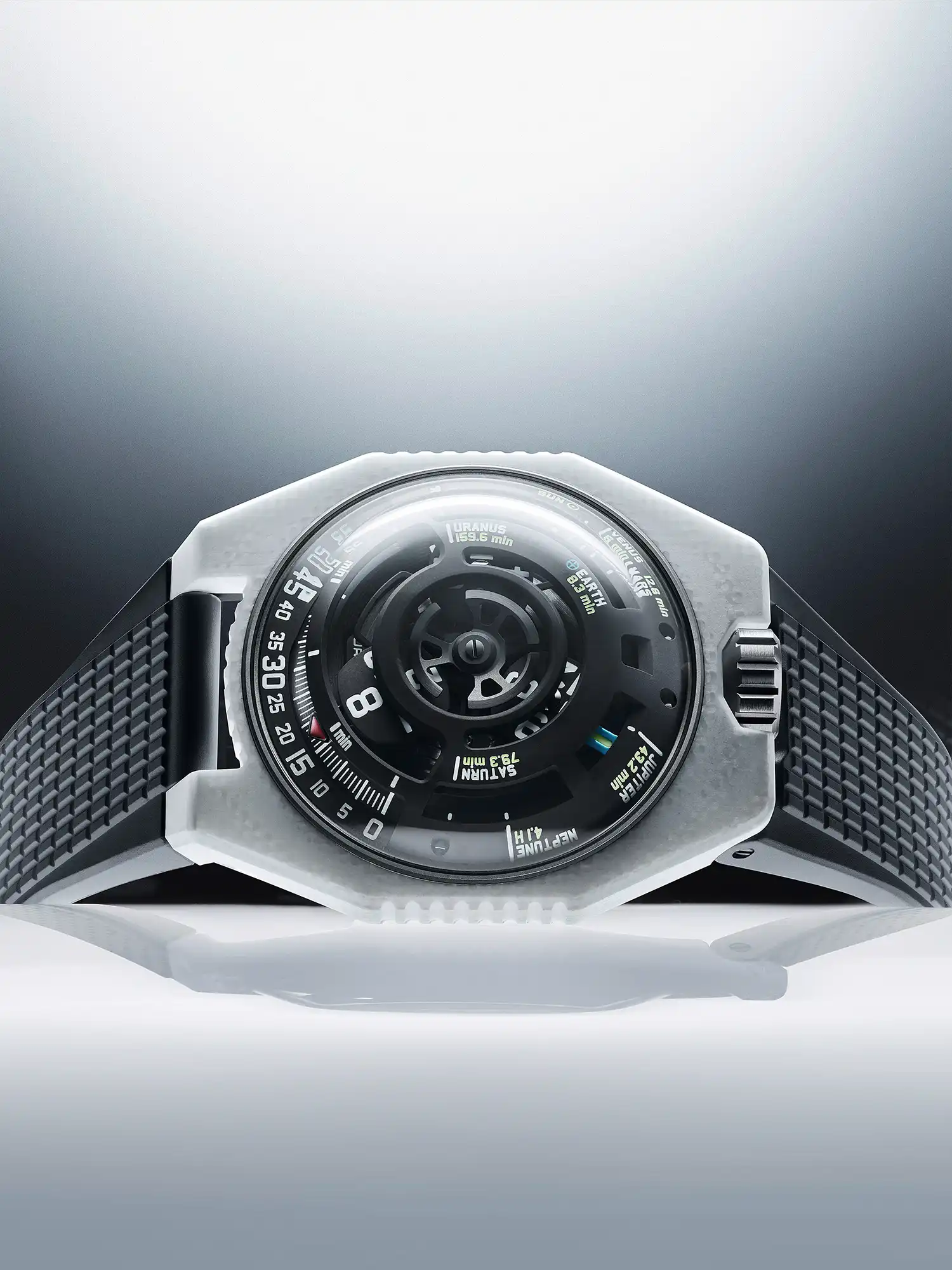 Frontal view of the URWERK UR-100V LS Ceramic showcasing the planetary complication and white aeronautical composite.