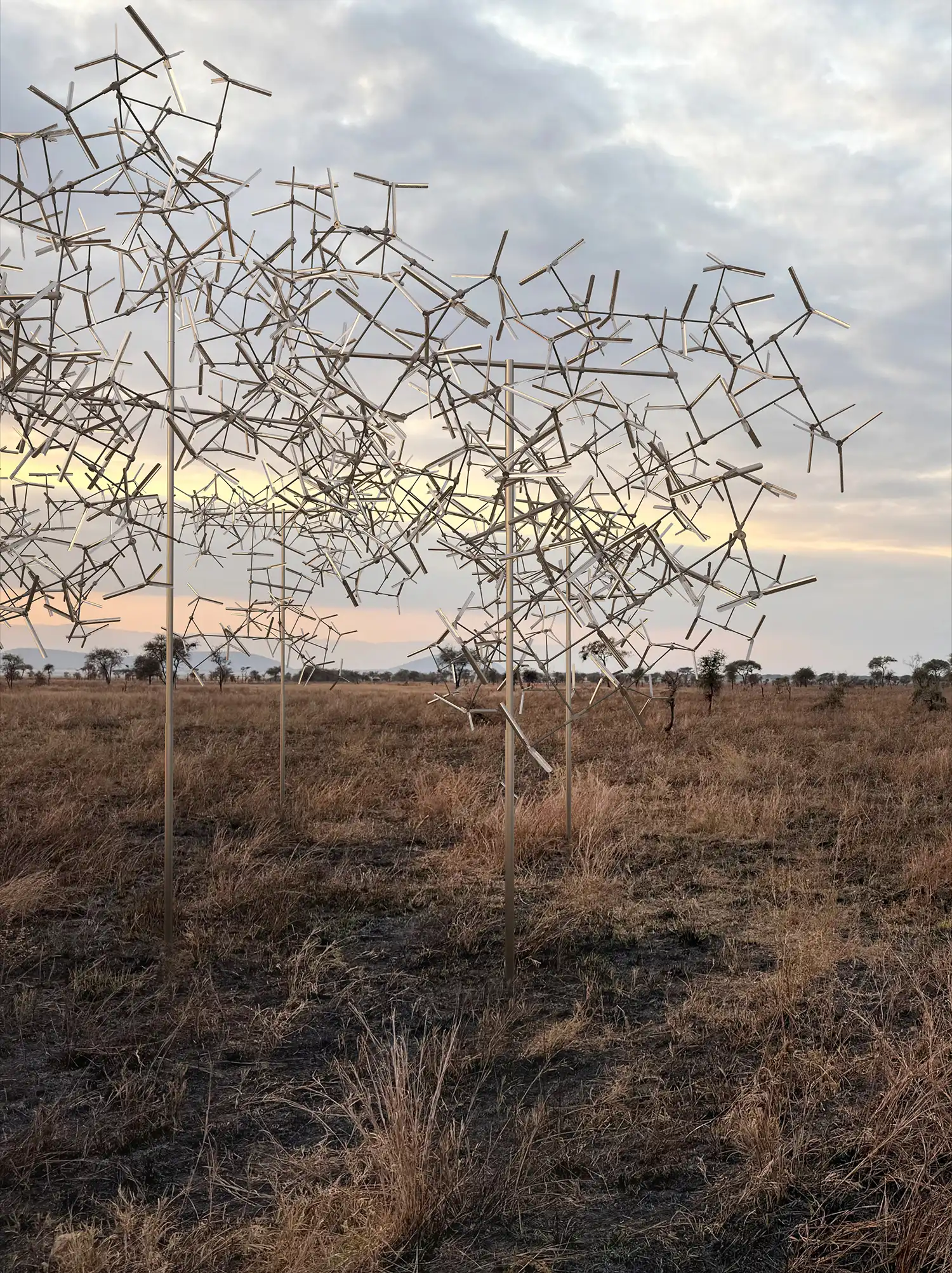 Vertical shot of the kinetic installation at twilight.