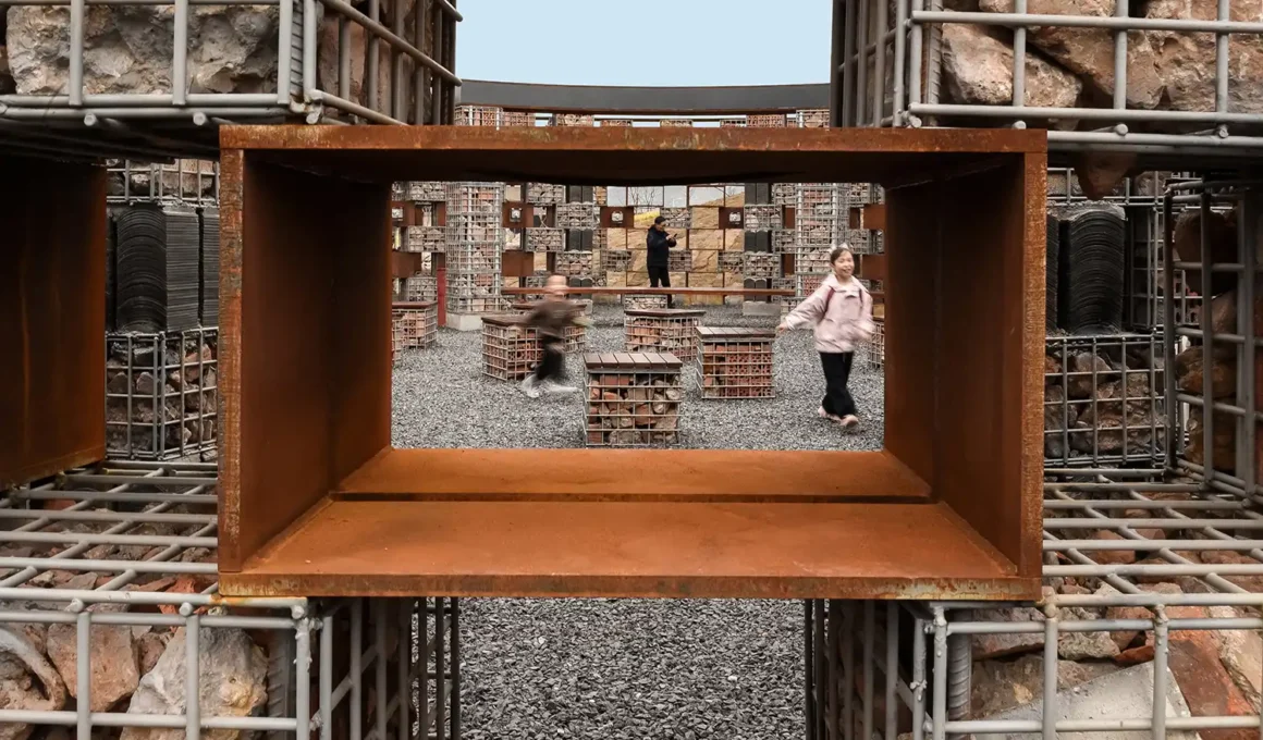 A framed view through a rusted metal void showing children playing in the Echo Plaza.