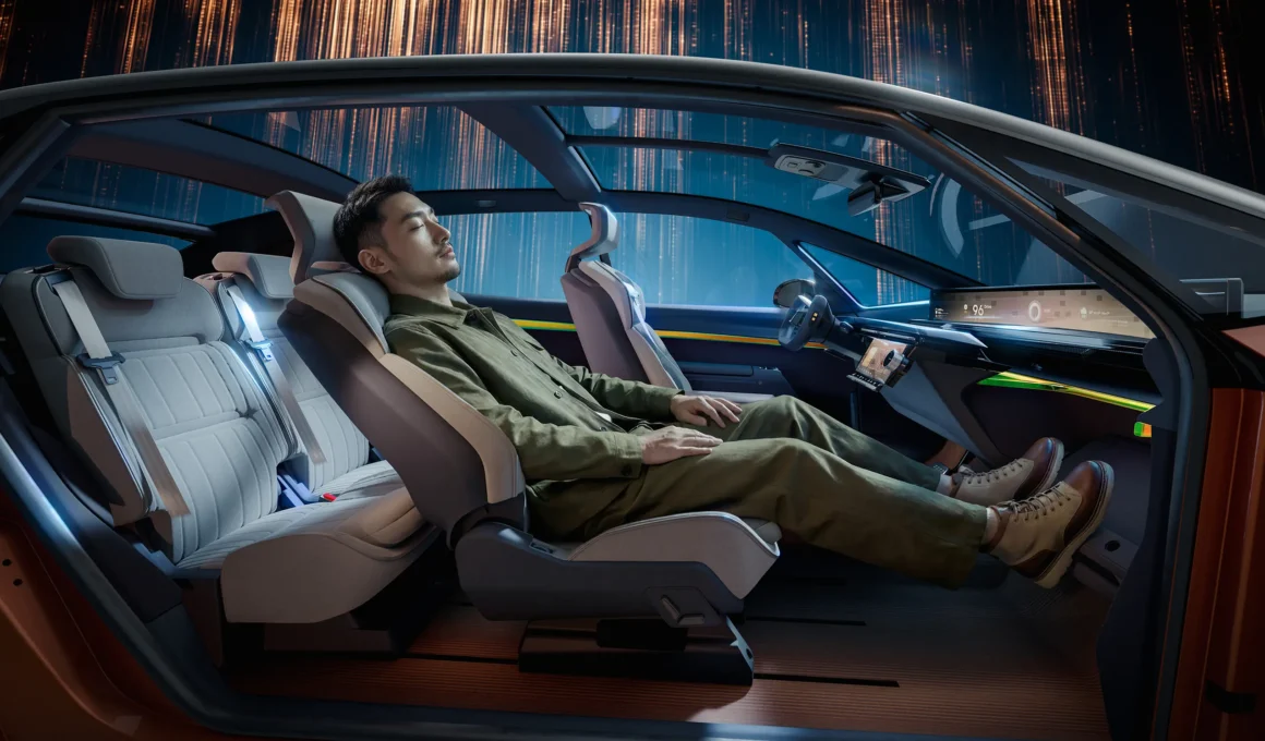 Side profile of Renault R-Space Lab interior with a passenger in a reclined front seat.