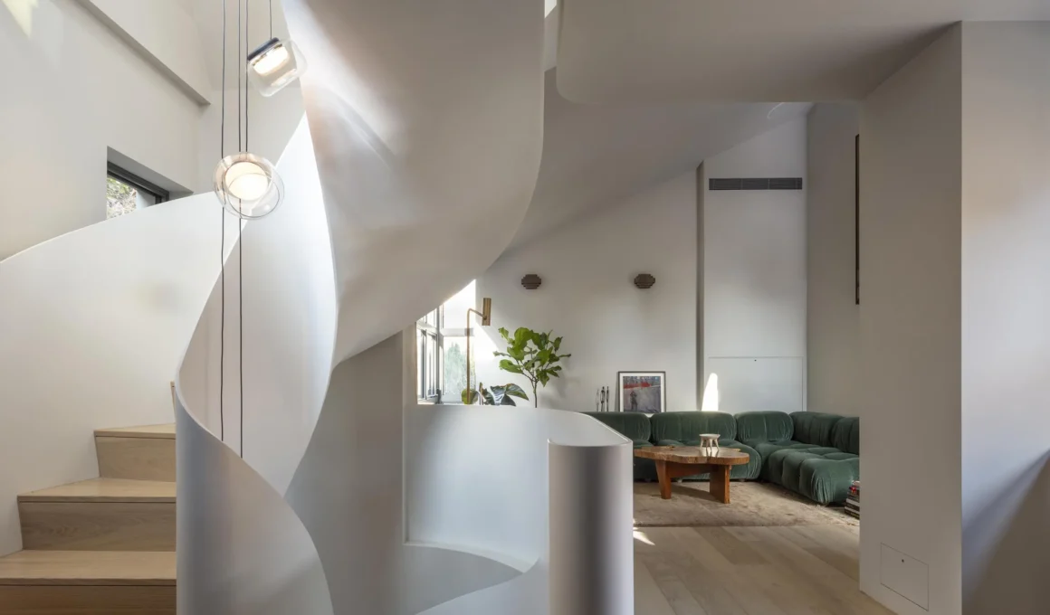 Sculptural white helix staircase in a modern London living room by Archi-Tectonics.