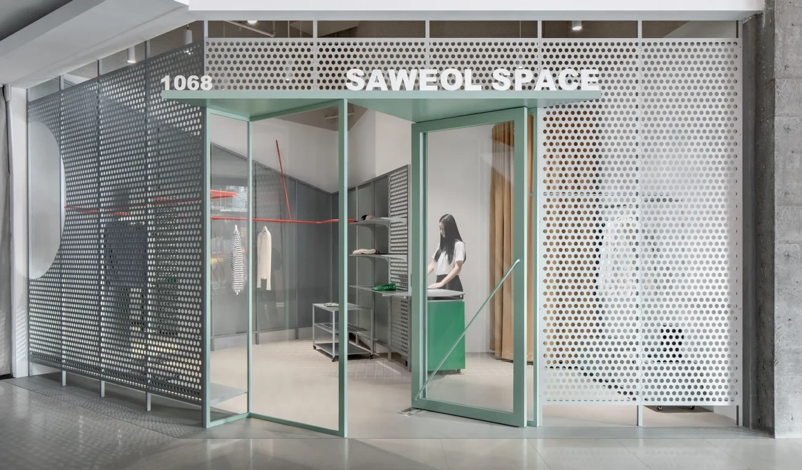 Exterior view of Saweol Space in Shanghai mall featuring mint green metal door frames and perforated panels.