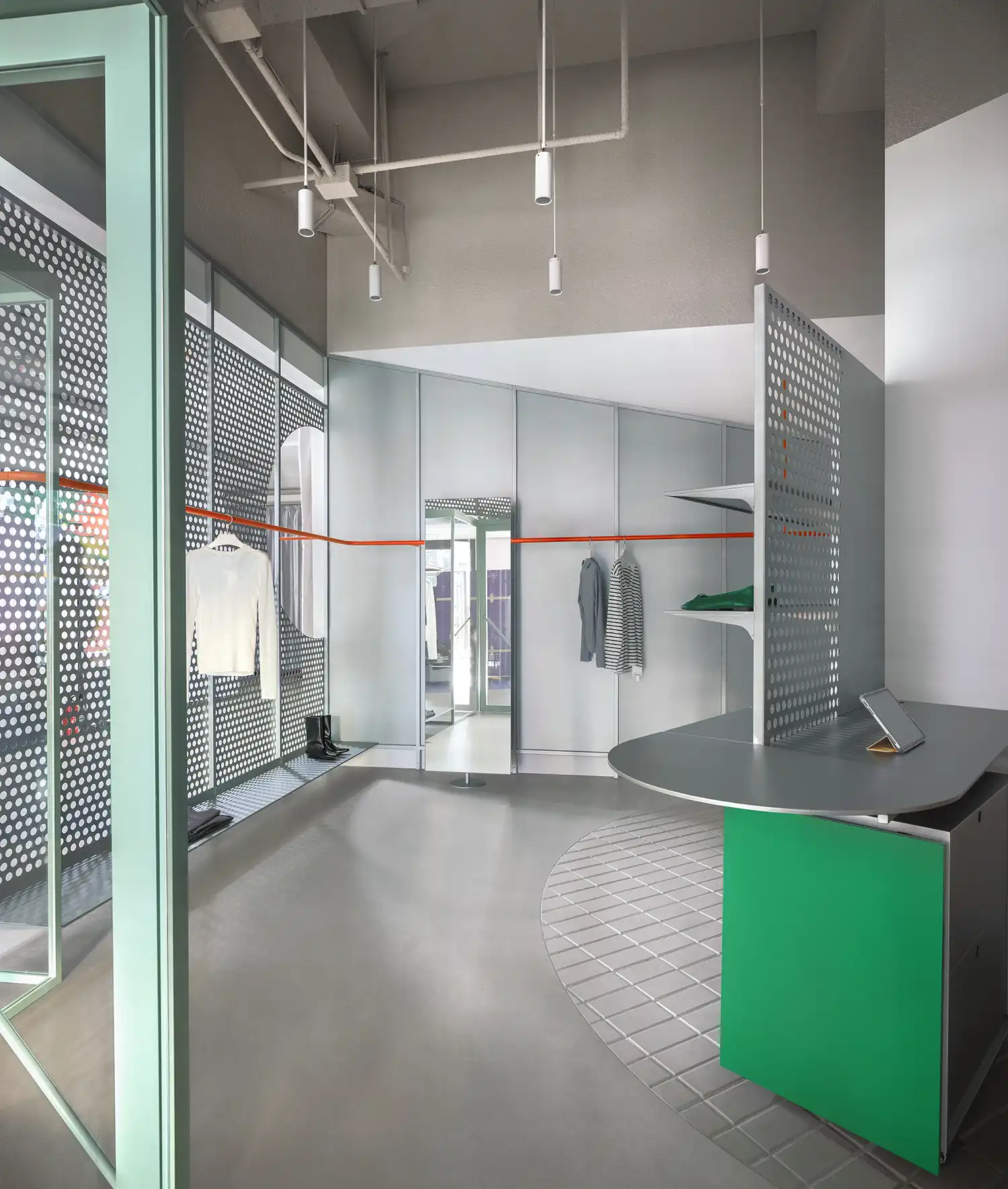 View from the entrance of Saweol Space showing the mint green door and the interior display layout.
