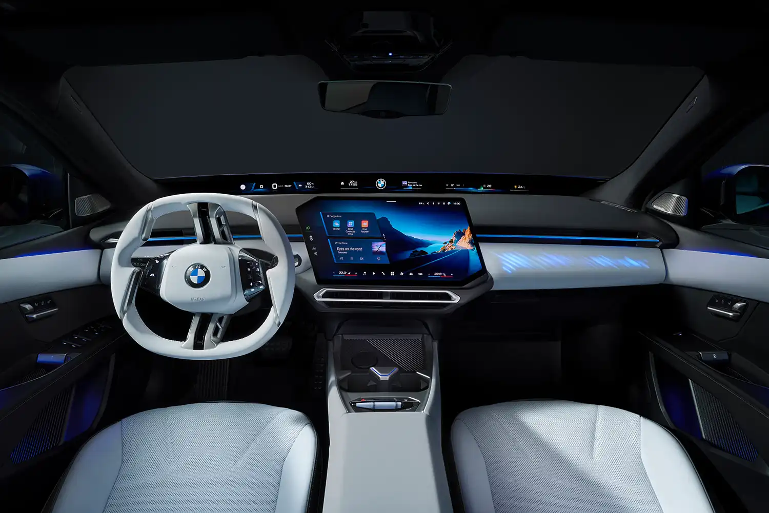Interior cockpit view of the BMW i3 featuring the Panoramic iDrive display.