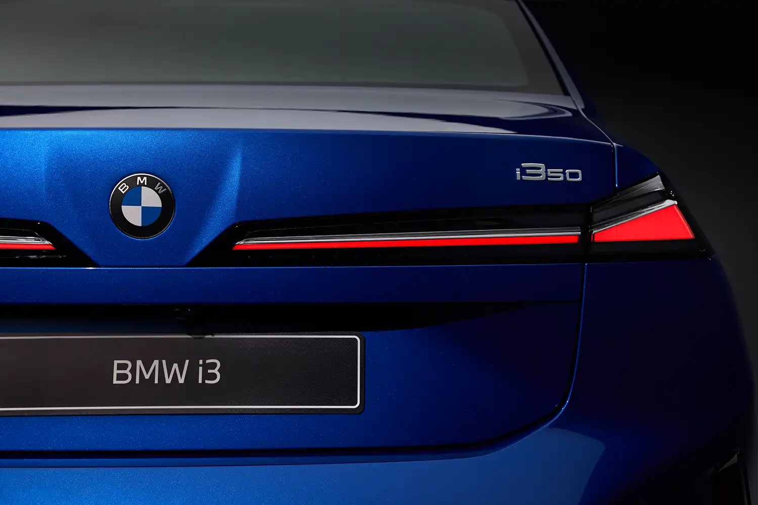 Close-up of the BMW i3 rear horizontal light bar and i3 50 badging.