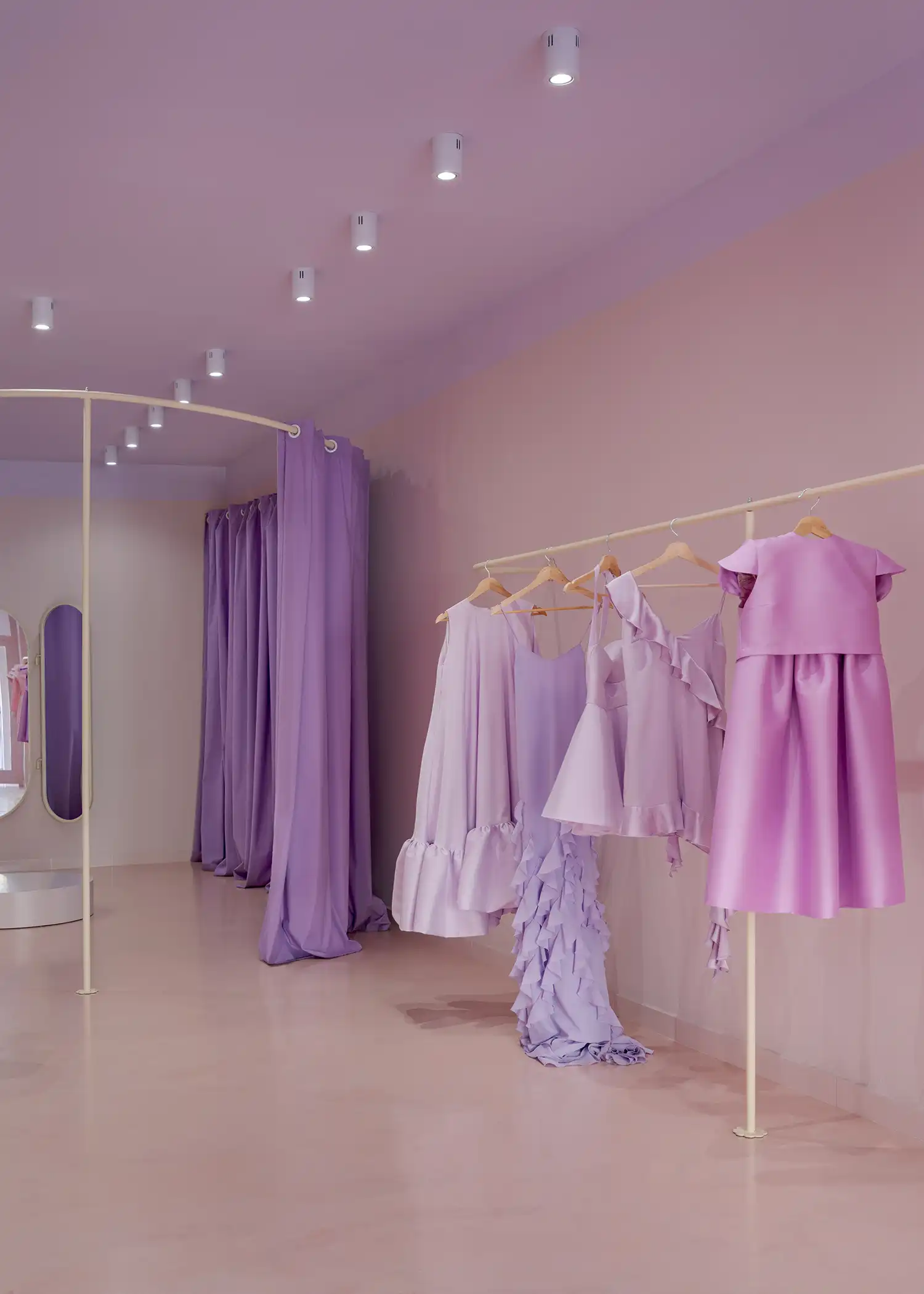 wide-angle view of a clothing rack and curtains