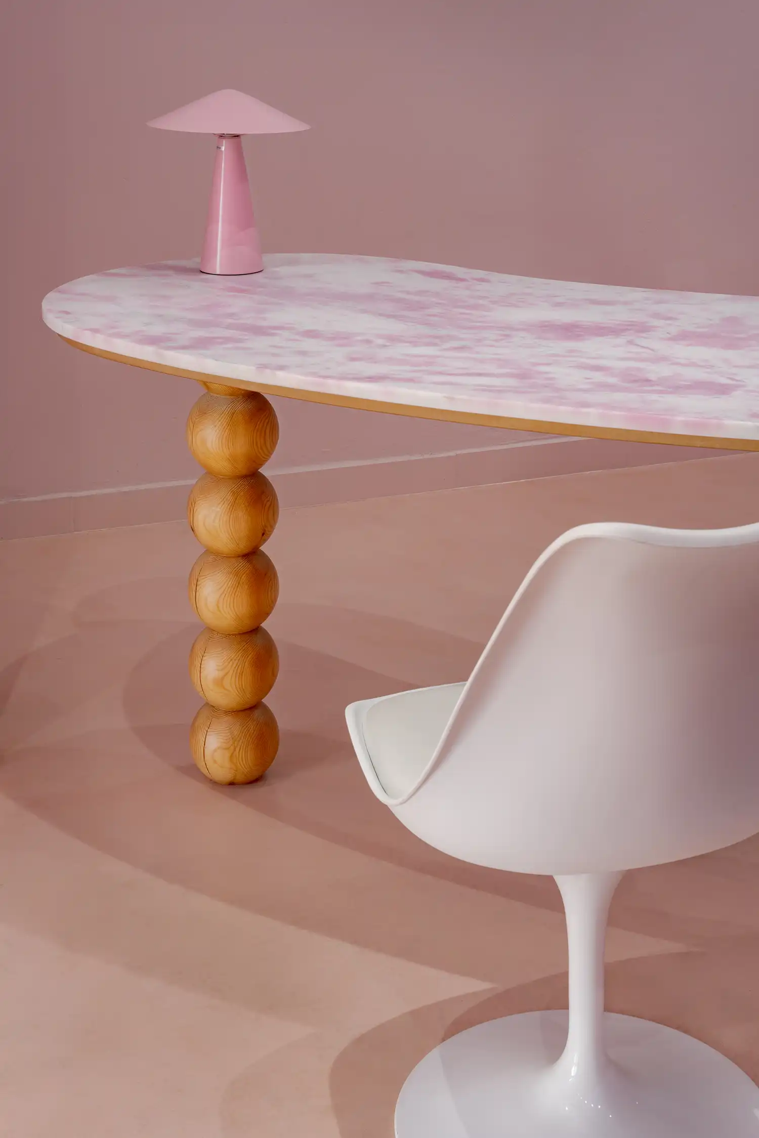 detailed view of a marble table with spherical legs