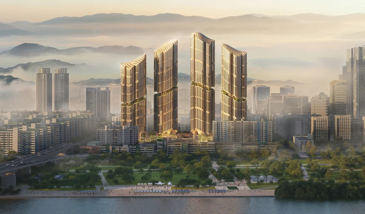 Wide aerial rendering of Heatherwick Studio's undulating residential towers on the Han River in Seoul.