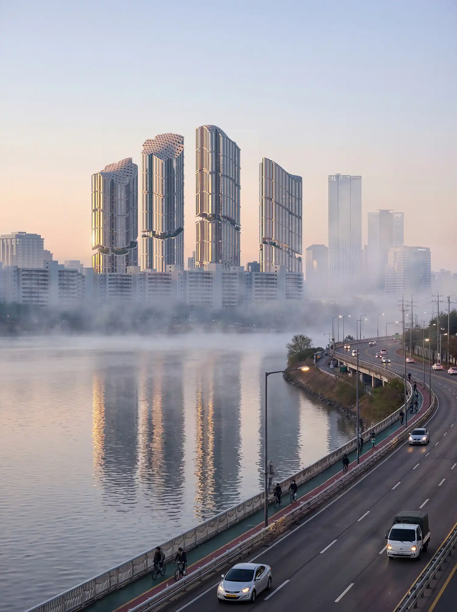 View from a bridge of the new Daegyo Apartments towers reflecting in the Han River during sunrise.