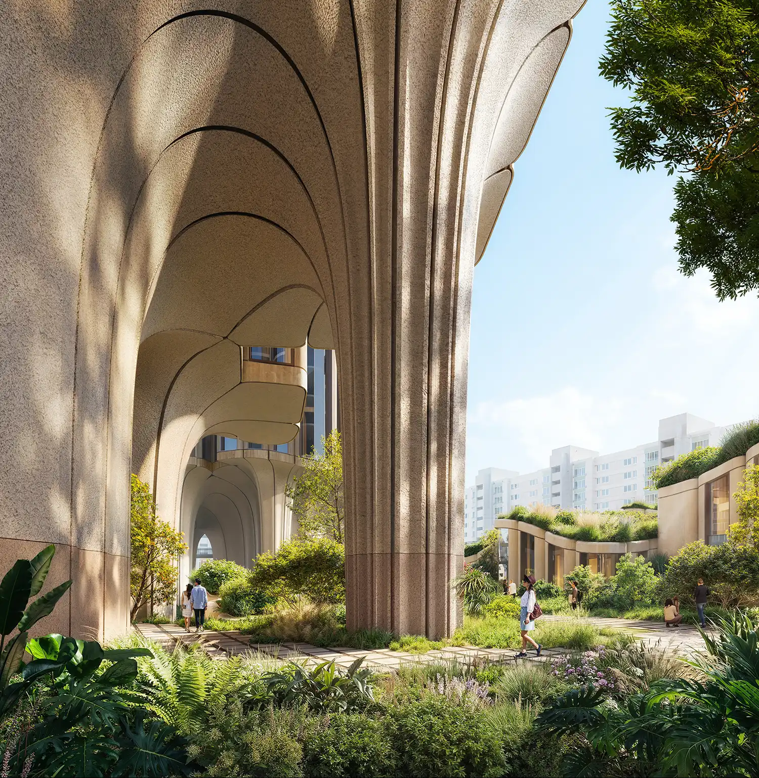 Close-up of the textured structural columns and landscaped pathways at the base of the towers.