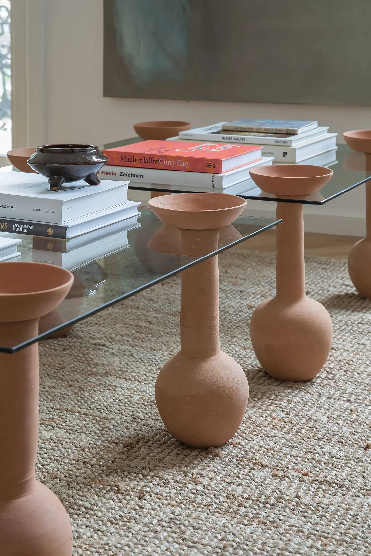 Detail of terracotta legs of the PIALA Coffee Table by Idaaf Architects.