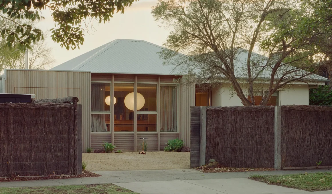 Exterior view of Wood House in Barwon Heads with timber cladding and a peaked roof.