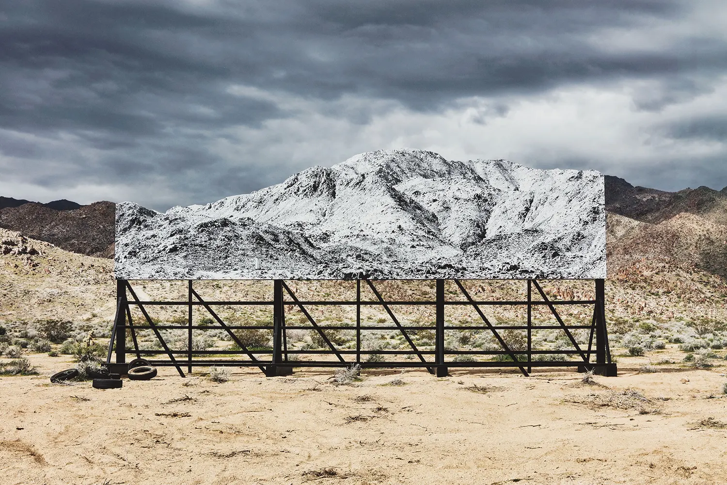 Exhibition view of JR's solo show 'Horizons' at Perrotin Los Angeles, featuring monumental ink-on-wood installations and photographic works.