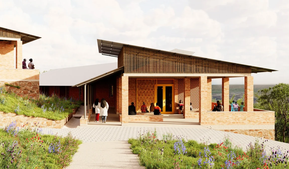 Close-up of a brick pavilion at Ineza Clinic with a large overhanging roof and integrated seating alcoves.