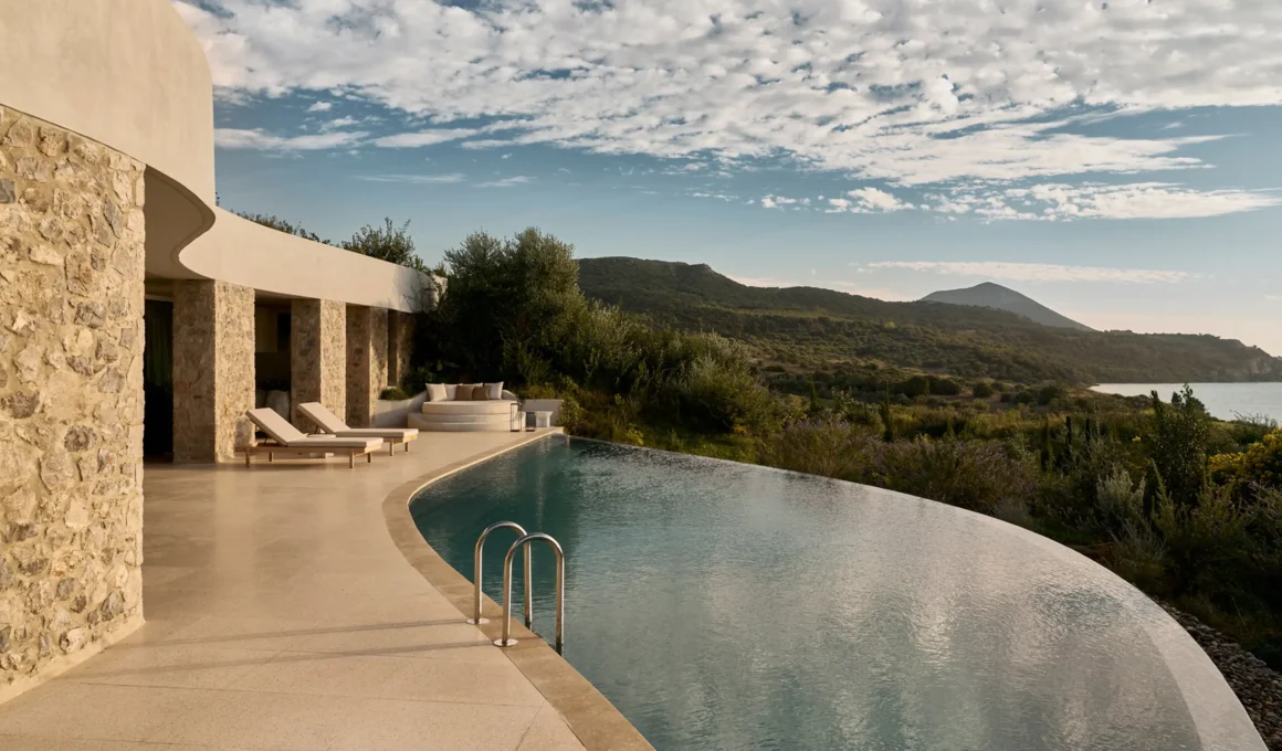 Earth-sheltered architecture of Mandarin Oriental Costa Navarino with green roofs.