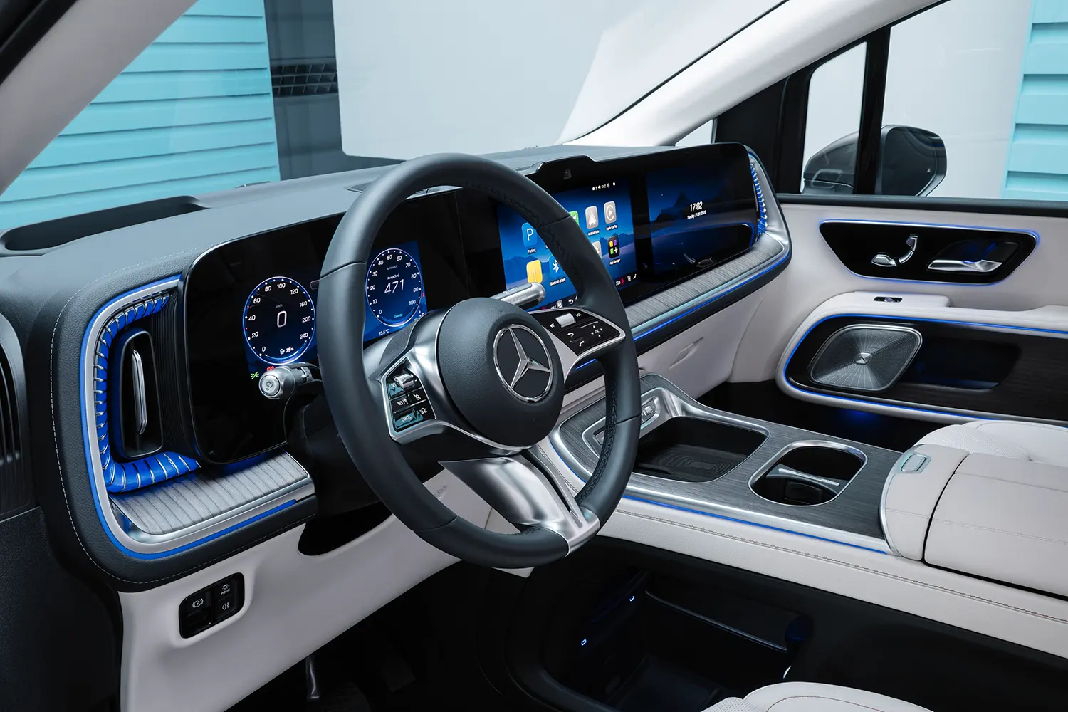 View of the VLE's front cockpit featuring the MBUX Superscreen and ambient lighting.