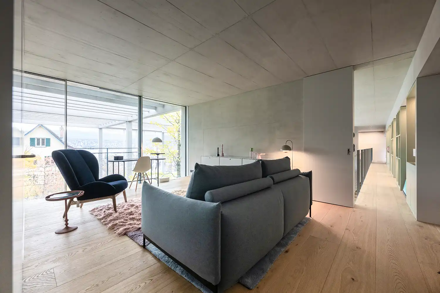 Upper floor mezzanine lounge Atrium Villa Zurich NOA Network of Architecture mesh railing