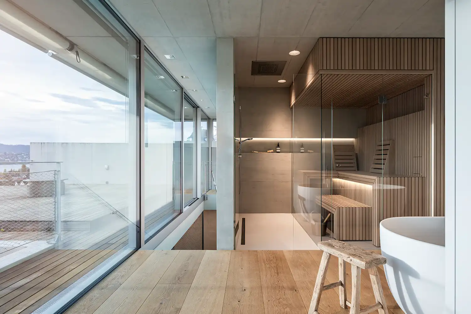 Wellness area private sauna freestanding tub NOA Network of Architecture Atrium Villa Zurich