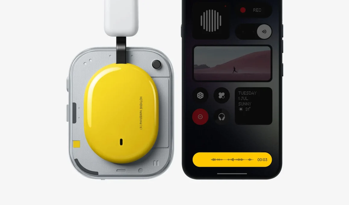 Top-down view of yellow Nothing Headphone (a) earpiece next to a smartphone interface.