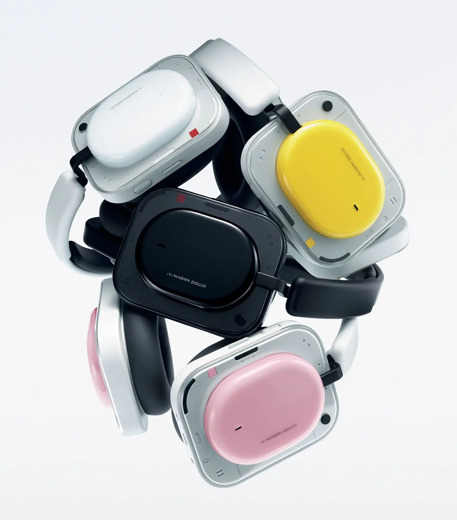 All four colors of Nothing Headphone (a) arranged in a circular, floating composition.