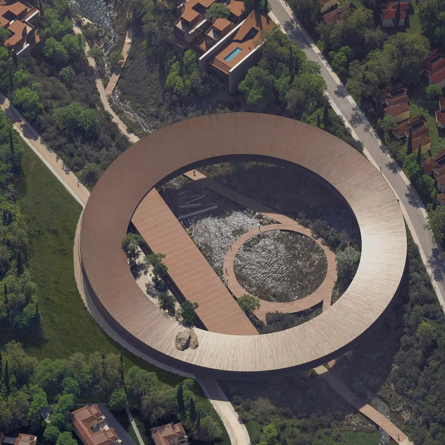 Top-down aerial of Snøhetta The Ring circular building and internal courtyard