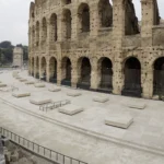 Aerial view of the travertine paving and stone imprints at the Colosseum southern ambulatory