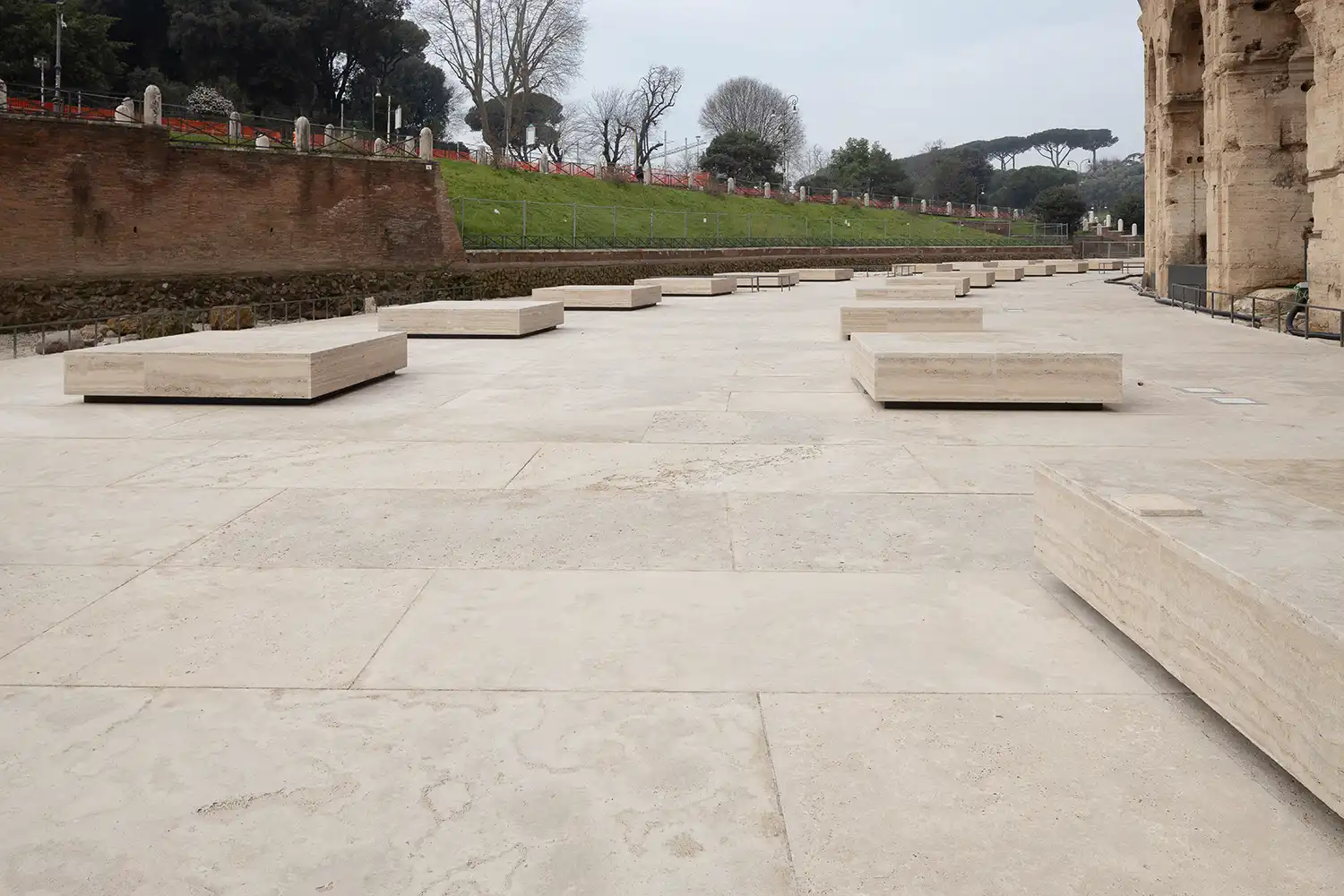 Detailed view of trapezoidal travertine slabs and compensation strips