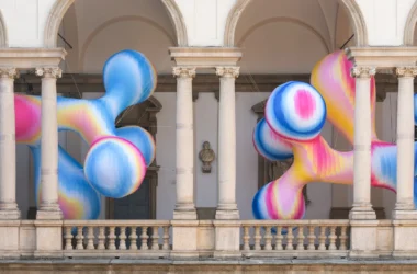 Vibrant, organic inflatable sculptures in a color-gradient landscape at the Serotonin installation by Sara Ricciardi for American Express at Milan Design Week 2026.