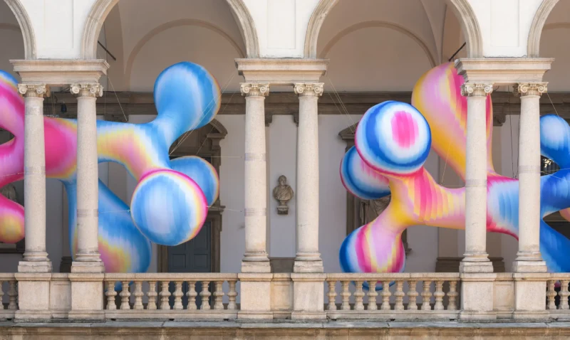 Vibrant, organic inflatable sculptures in a color-gradient landscape at the Serotonin installation by Sara Ricciardi for American Express at Milan Design Week 2026.