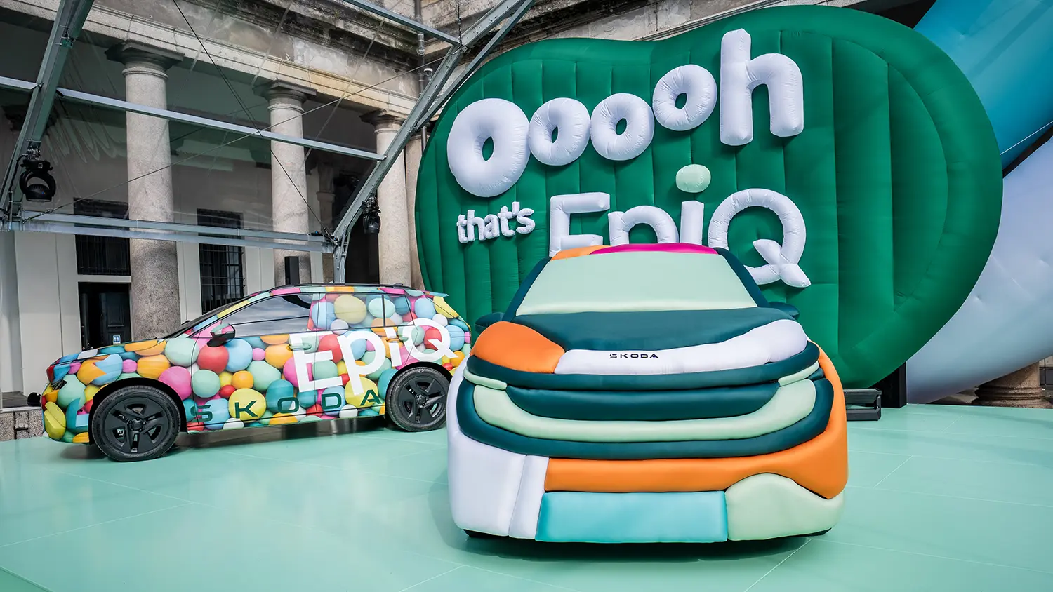 Skoda and Ulises Studio installation with cars wrapped in colorful inflatables at Palazzo Senato.