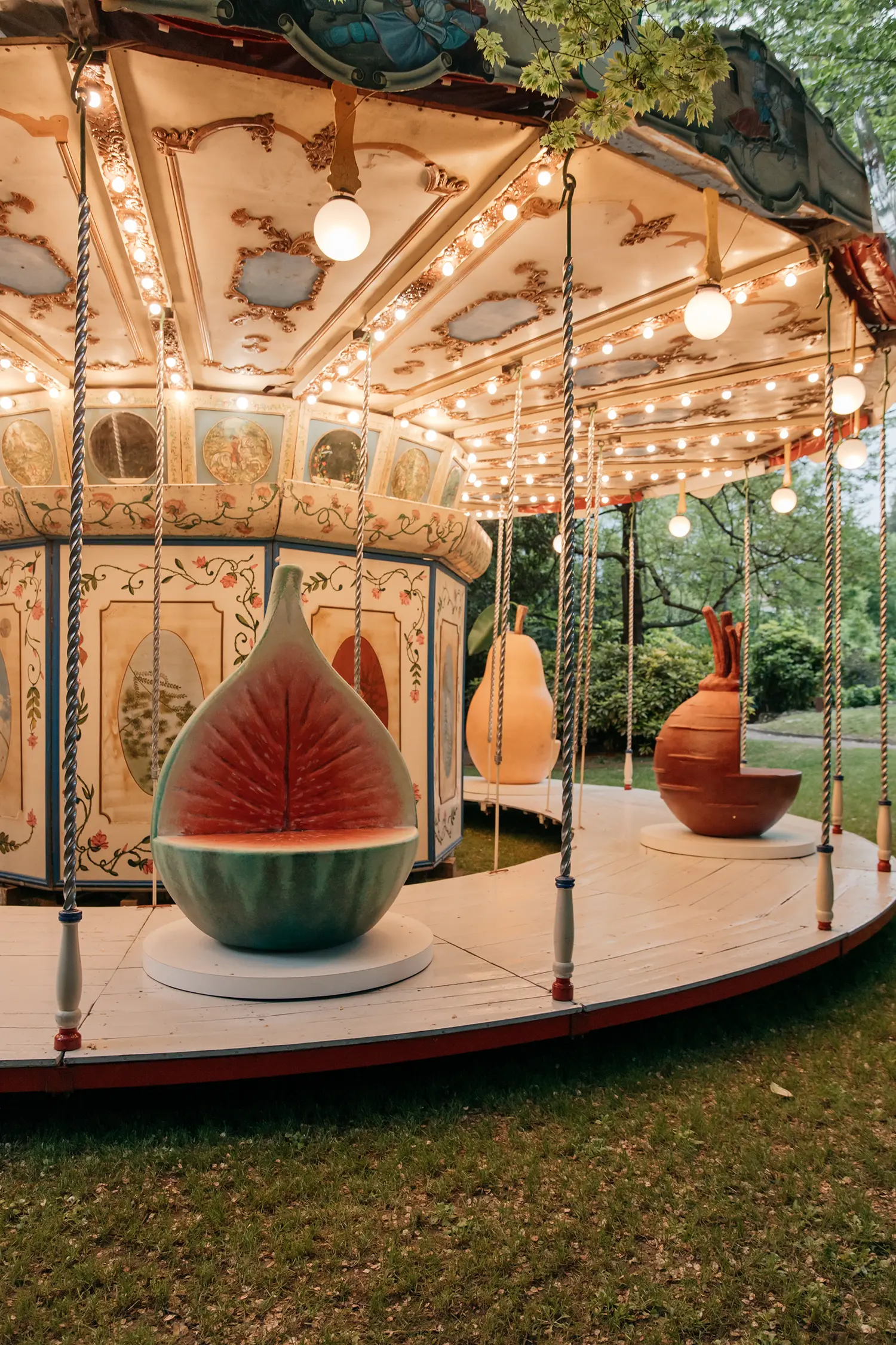 Customized carousel featuring miniature pastry sculptures by Laila Gohar for Arket.