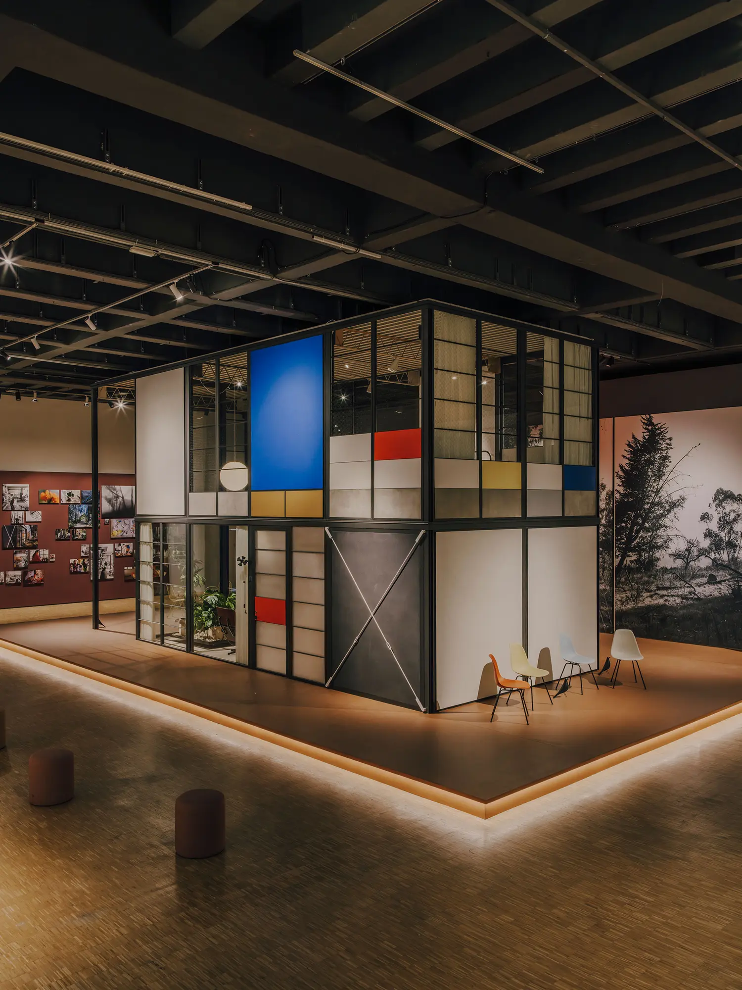 Eames Pavilion System by Kettal in wood and glass within the Triennale gardens.