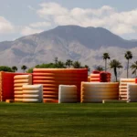 Aerial view of Maze installation by Sabine Marcelis at Coachella 2026 with desert mountains.