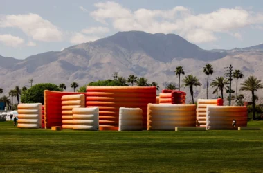 Aerial view of Maze installation by Sabine Marcelis at Coachella 2026 with desert mountains.