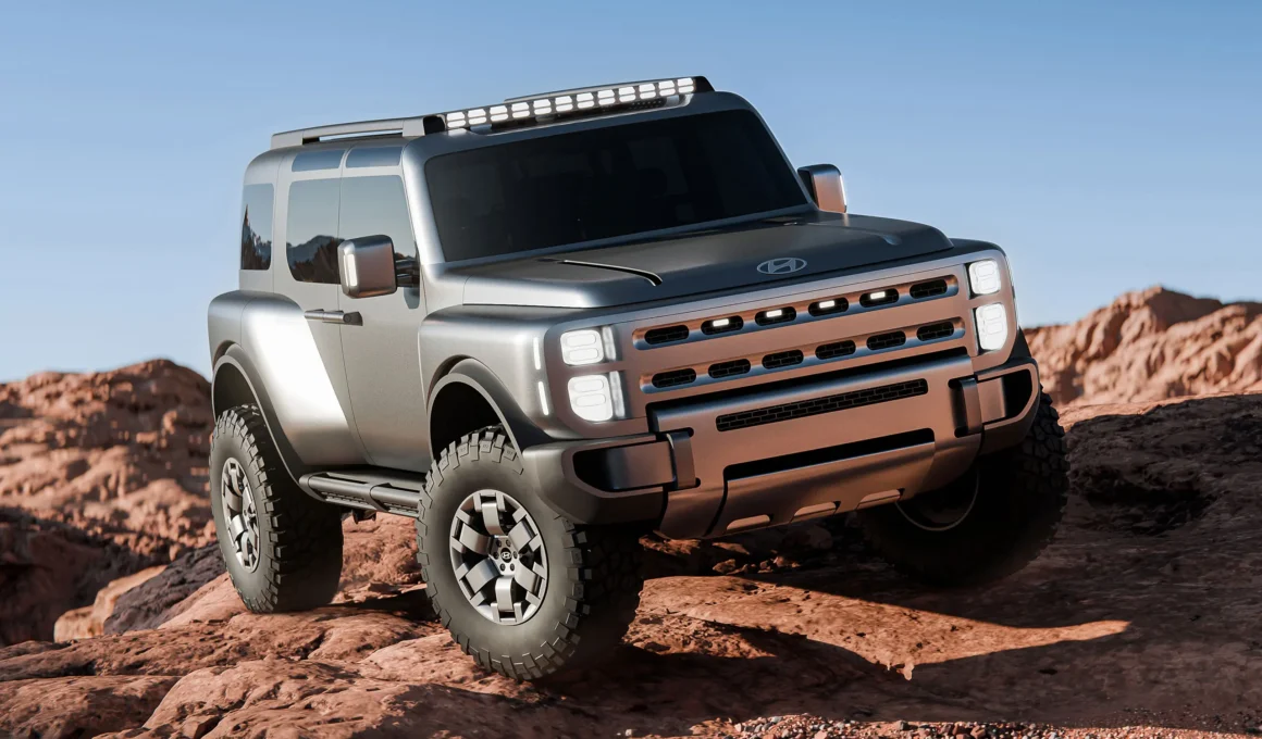 Front three-quarter view of the silver Hyundai Boulder Concept SUV on a rocky desert ridge.
