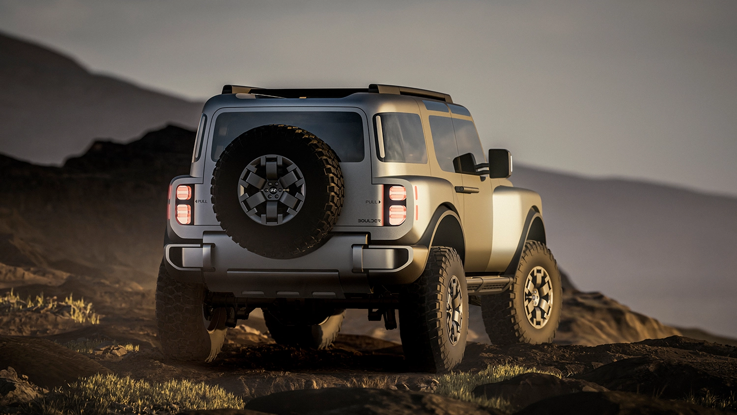 Rear three-quarter view of the Hyundai Boulder Concept with a tailgate-mounted spare tire.