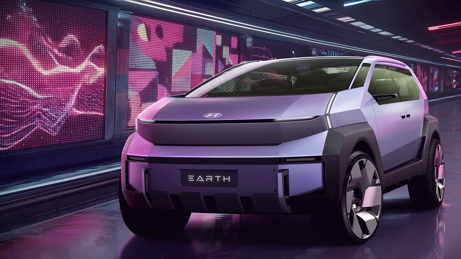 Front view of the Hyundai EARTH concept SUV with "EARTH" lettering on the bumper and a rugged, futuristic aesthetic.