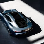 Top-down view of the Lynk & Co GT concept in Apex Blue, showcasing the glass roof and streamlined aerodynamic silhouette.