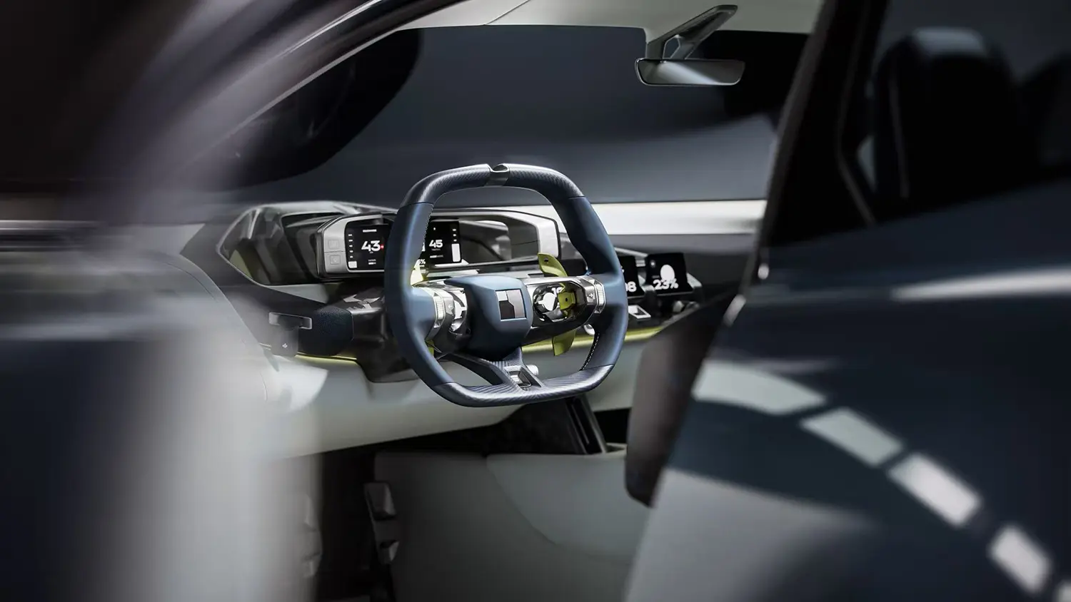 Close-up of the yoke-style steering wheel and folding instrument cluster in the Lynk & Co GT concept.