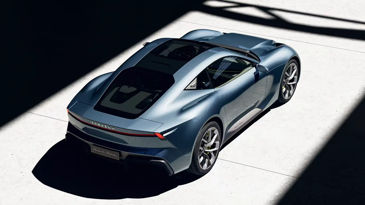 Rear three-quarter view showing the integrated LED taillight strip and muscular rear haunches.