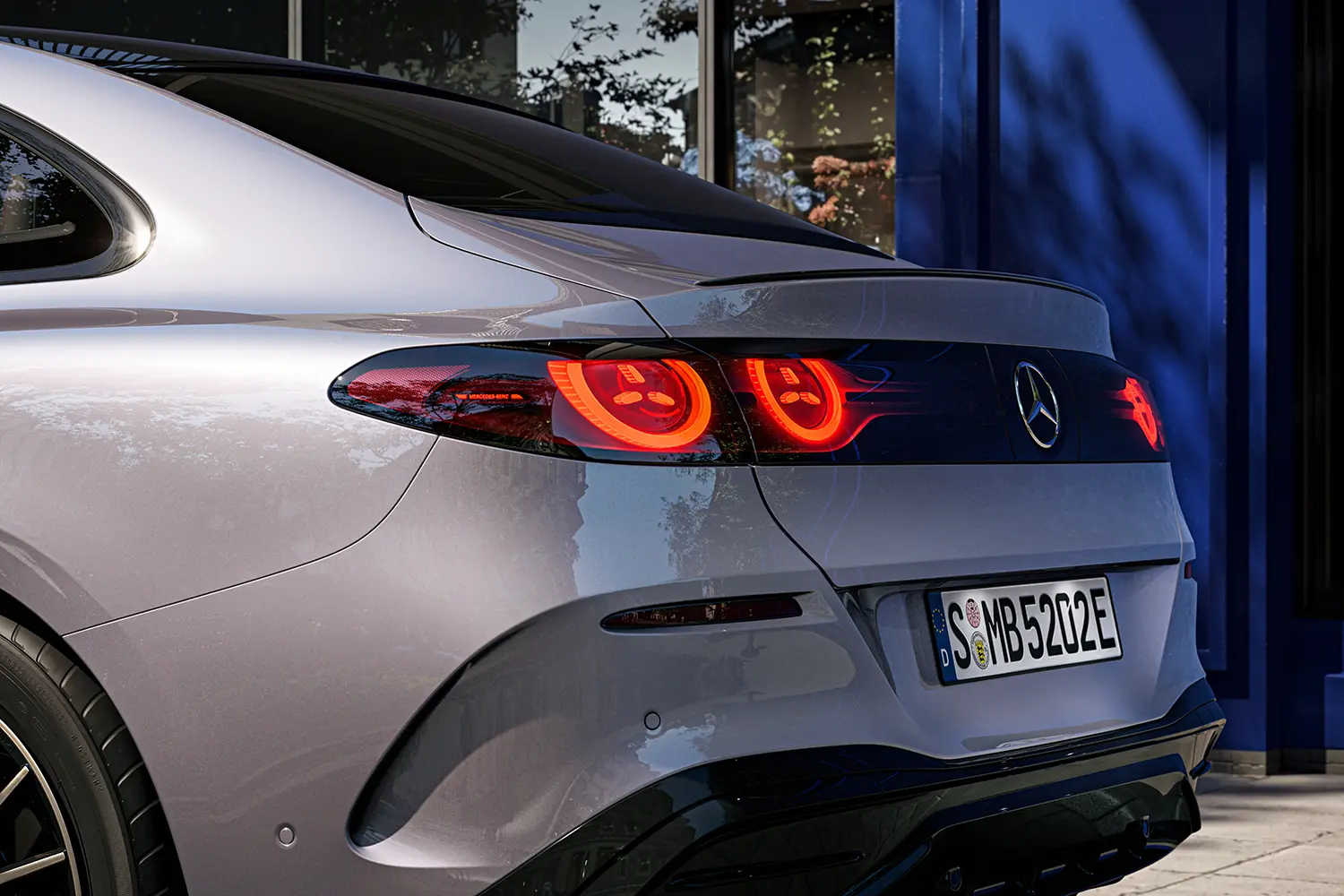 Detailed view of the illuminated circular rear lights of the electric C-Class.