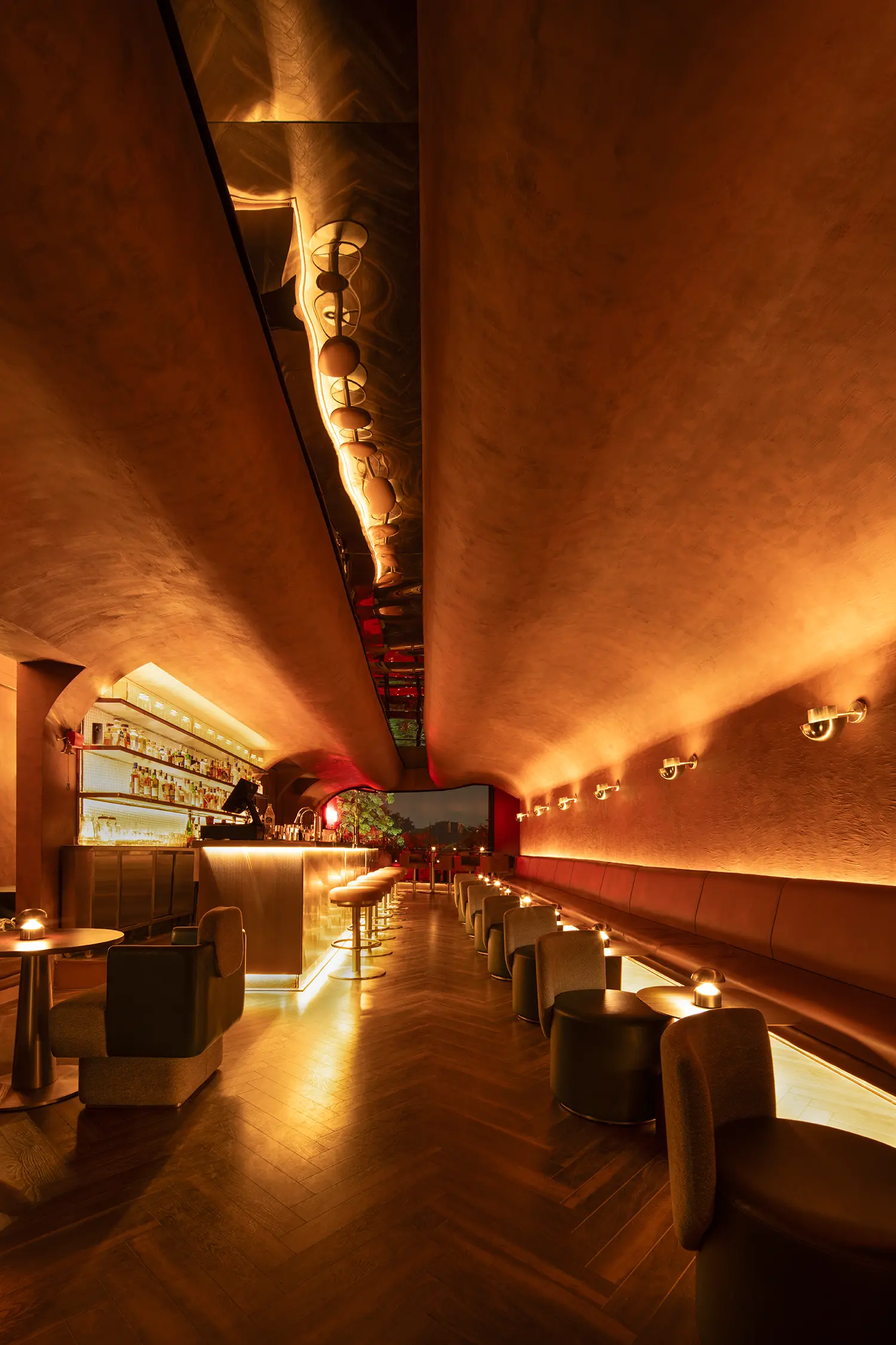 Perspective view of No Vacancy bar showing the mirrored ceiling and the transition toward the entrance.