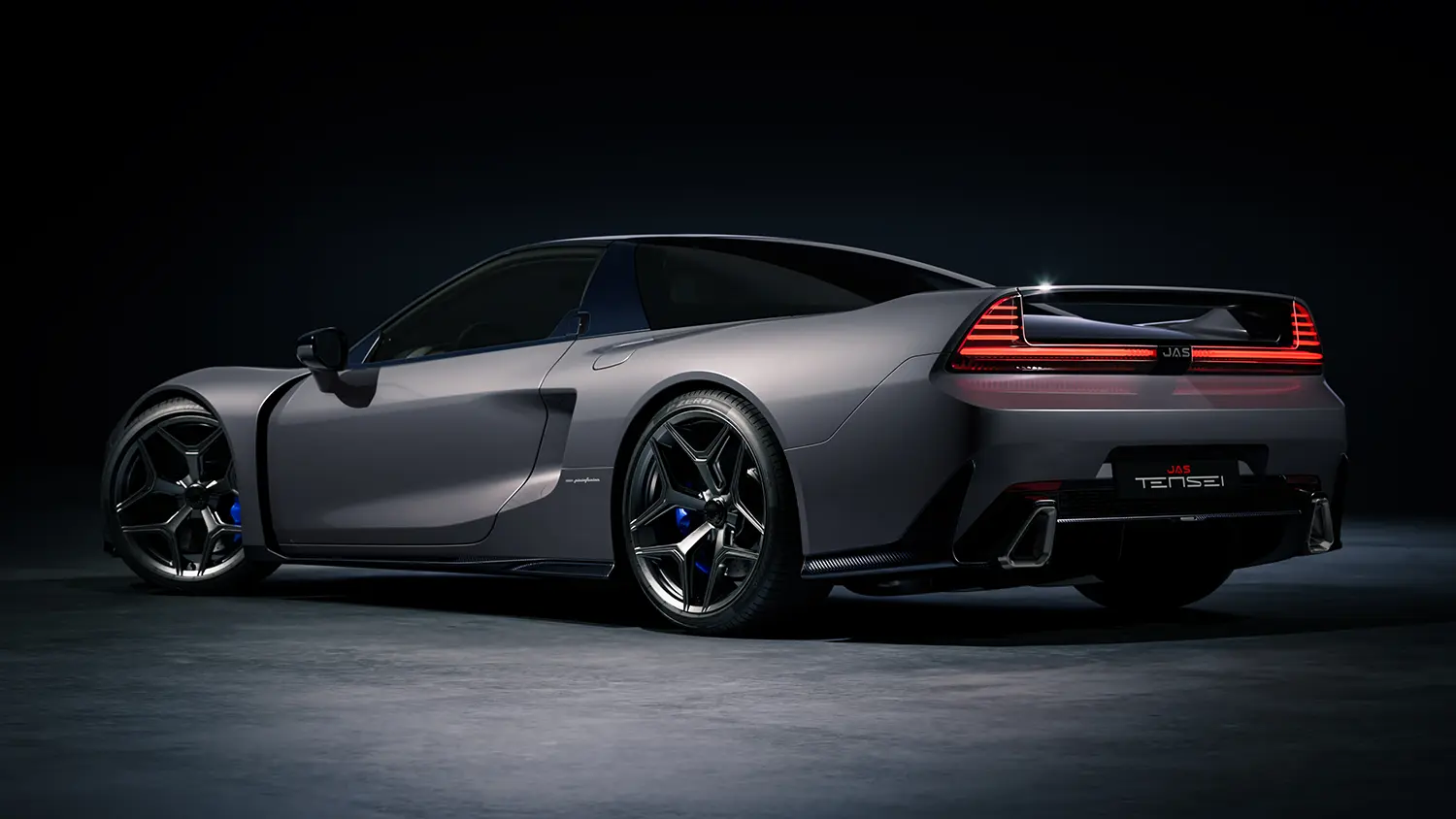 Rear three-quarter view of the silver Tensei supercar showing the exhaust and diffuser.