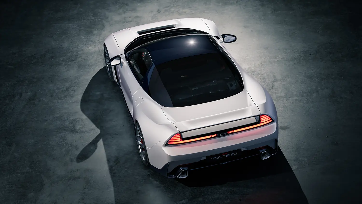 High-angle rear view of a white Tensei supercar in a minimalist concrete environment.